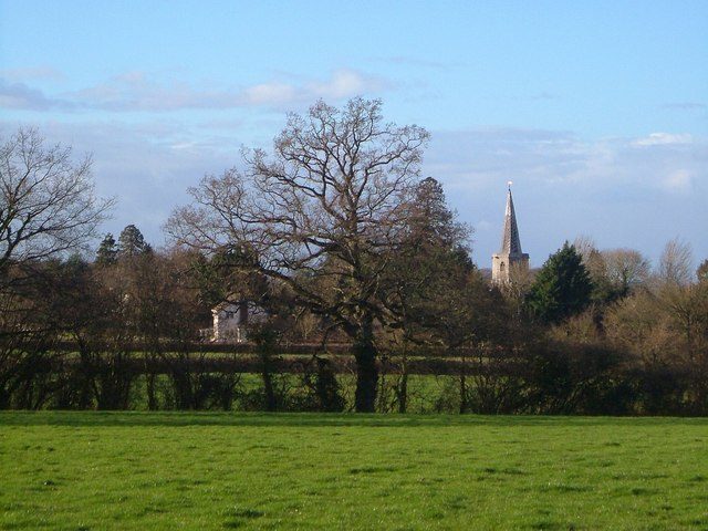A footpath across a field towards Pitminster, the church spire visible ahead